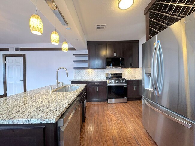 Building Photo - Updated Home with Historic Charm! 3bed/2 bath Refrig A/C across from Park! Water Included!