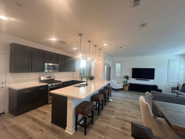 Building Photo - Modern 4 Bedroom Home with Downstairs Suite, Owned Solar & Resort-Style HOA Amenities