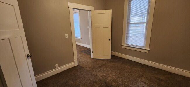 Building Photo - Spacious corner lot home with great natural light!