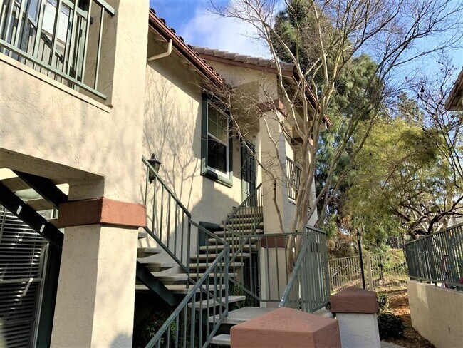 Building Photo - Sabre Springs Top Floor Condo with Carport