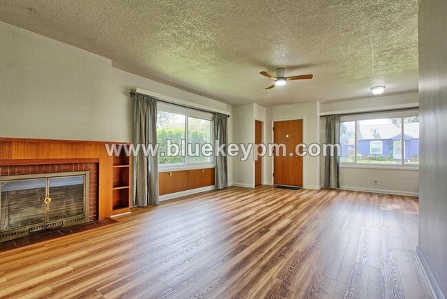 Building Photo - 4 Bedroom, 2 Bath Home with Primary on Main Floor, Basement and Large Fenced Yard