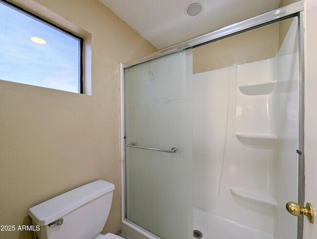 Building Photo - 8861 W Paradise Dr