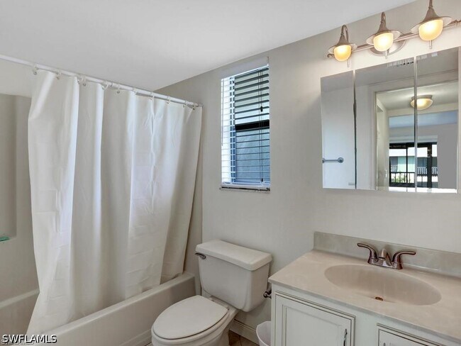 Building Photo - 4912 Tamiami Trl E