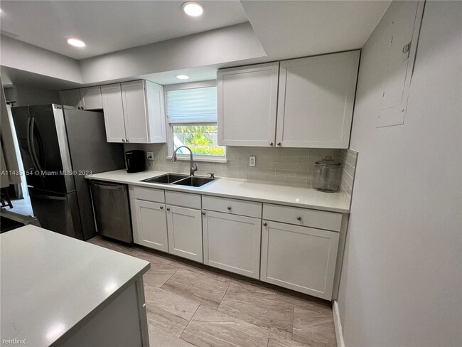 Building Photo - 3 br, 2 bath House - 1410 NE 56th Ct # 1412