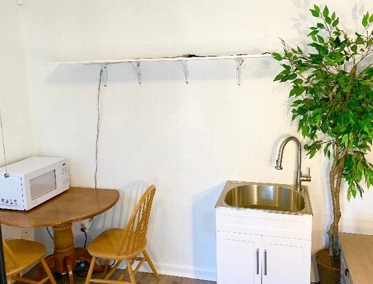 Kitchenette with 2 burner stove top. - 372 Chaucer Dr