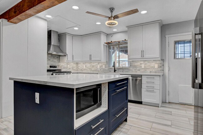 Building Photo - UNIQUE SINGLE FAMILY HOME! - No HOA, Car Lift, RV Parking and Nice Backyard