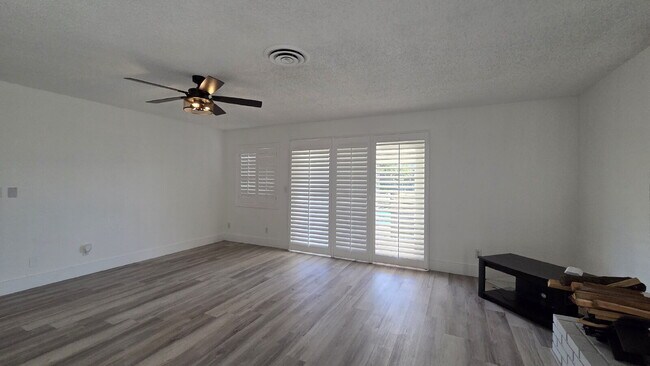 Building Photo - Beautifully remodeled pool home situated on a spacious quarter-acre lot