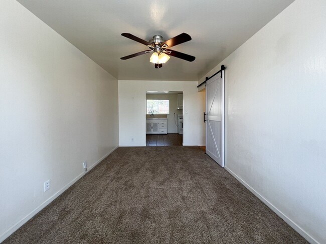 Building Photo - Charming 2 Bedroom, 1 Bathroom Home with Large Fenced Yard + Garage