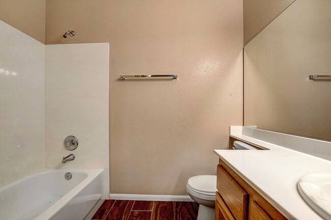 Building Photo - Gorgeous NW Single Story! 3 Car Garage! Serene Backyard.