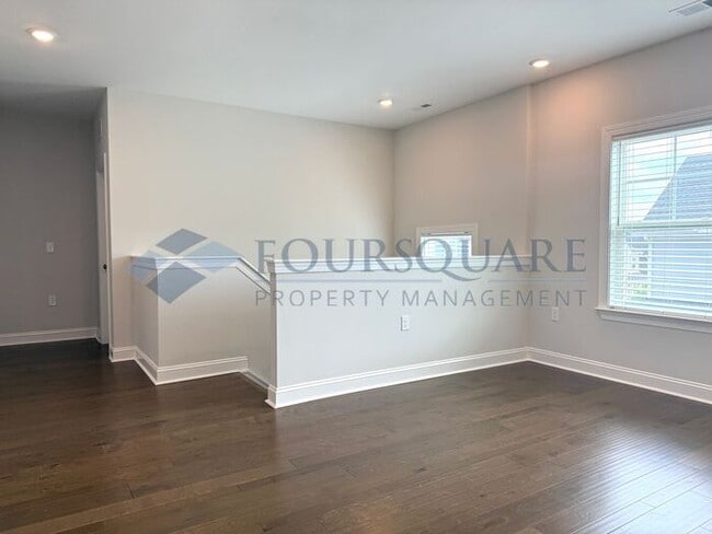 Building Photo - Spacious Corner-Lot Home with Guest Suite, Screened Porch & Detached 2-Car Garage – Resort-Style ...
