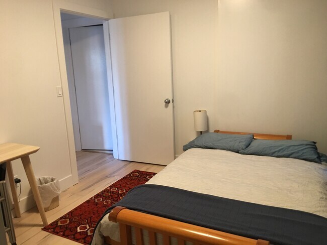 Bedroom 1 with desk and shelves - 1038 Pardee St