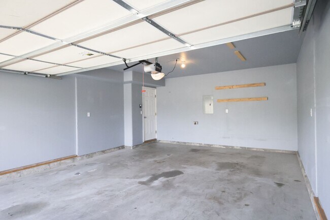 Building Photo - Refined Townhome with Gorgeous Landscaping...