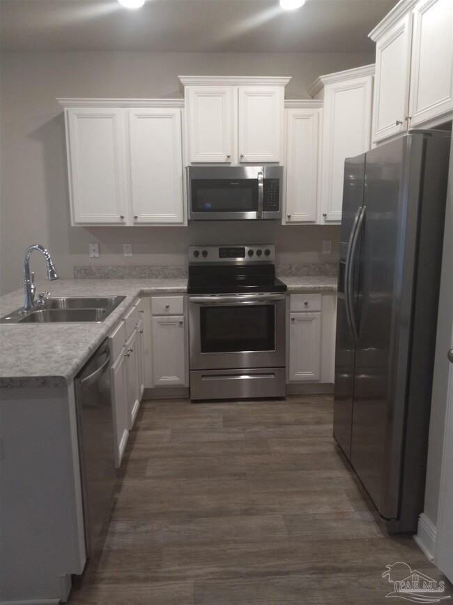 Building Photo - 6077 Royal Port Ct