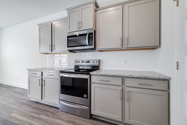 Building Photo - Beautiful 4BR Home in Woodland Trail – Top...