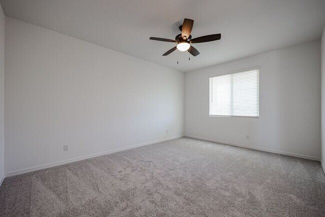 Building Photo - HOME IN LAVEEN! 4 BED 3.5 BA 3 CAR GARAGE!...
