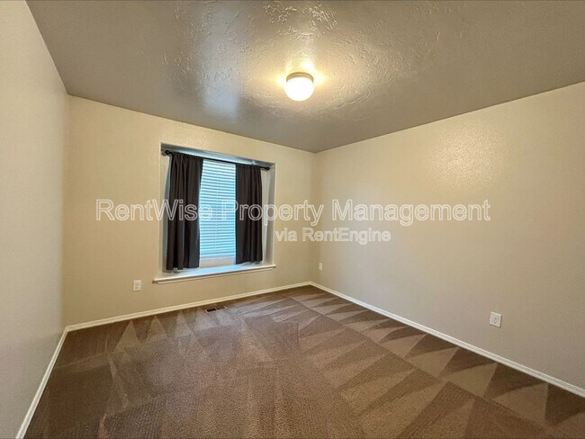 Building Photo - 5280 N Midnight Haze Way