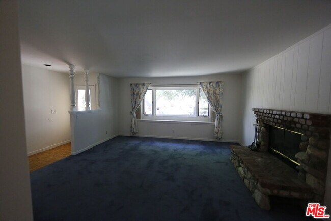 Building Photo - 7309 Asman Ave
