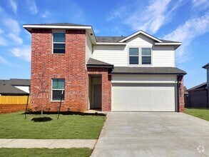 Building Photo - Stylish & Smart Living in Yukon – 4-Bedroo...