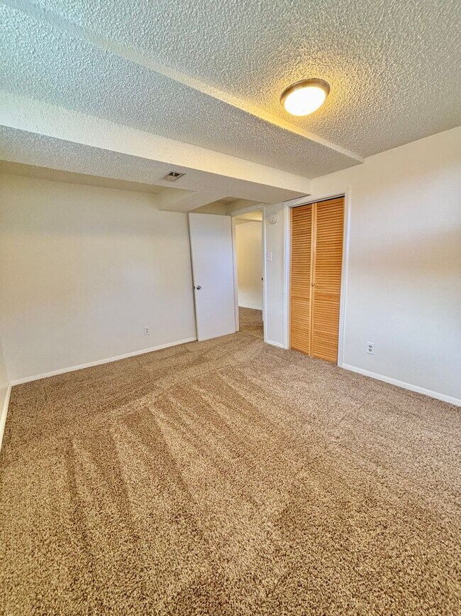 Building Photo - Expansive 5-Bedroom Home with Modern Comfort & Flexible Living Space! Available Now!!