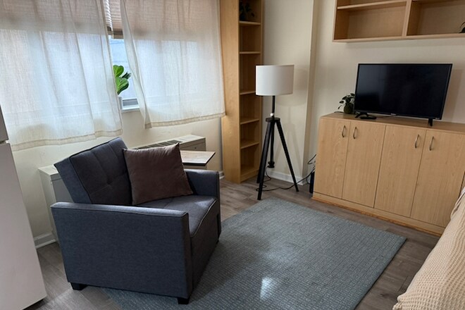 living area (TV + wifi + streaming included) - 1420 N St NW