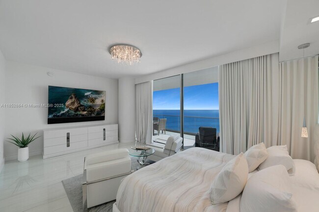 Building Photo - 10203 Collins Ave