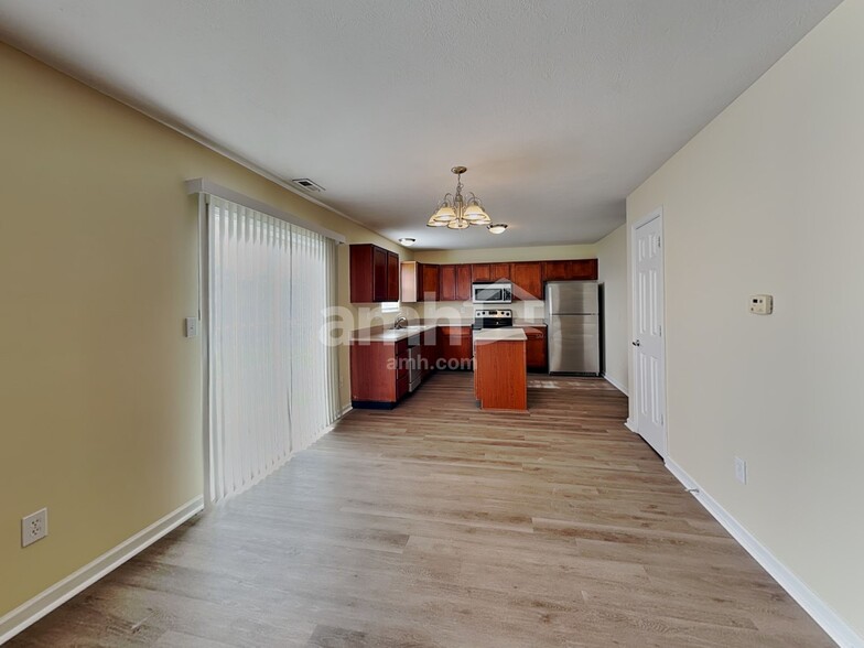Building Photo - 7674 Pipestone Dr