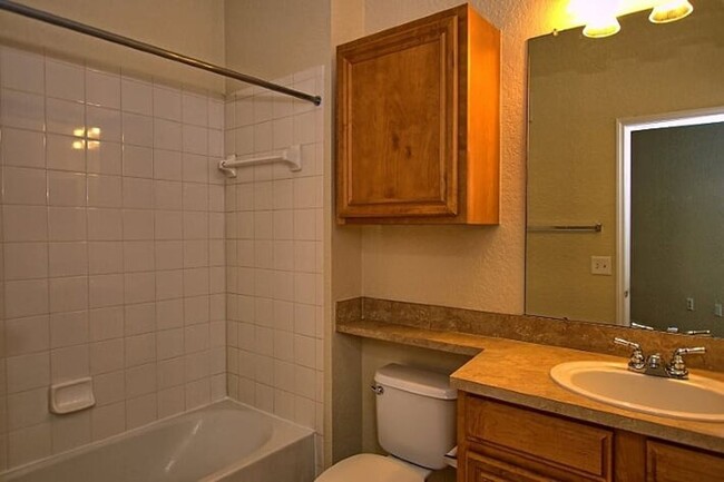 Building Photo - Private, updated, 2/2, 3rd-floor condo, wi...