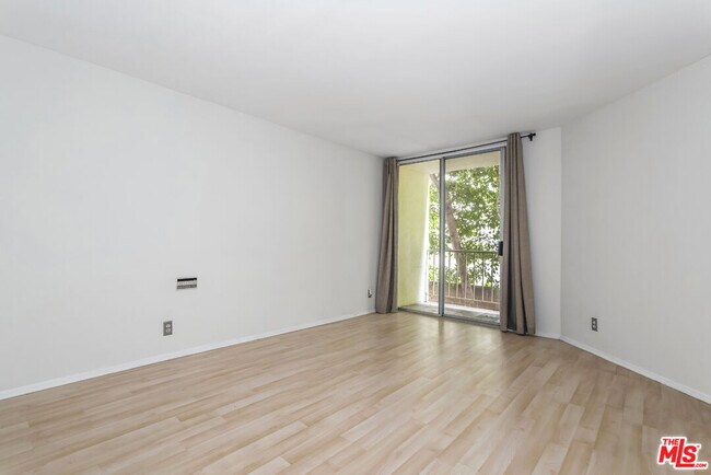 Building Photo - 1230 N Sweetzer Ave