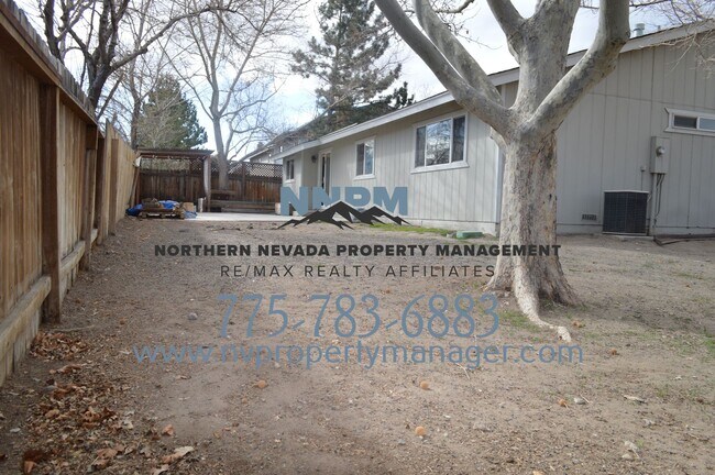Building Photo - $2200 ~ 4 Bed ~ 2 Bath ~ Large Home on Corner lot off of S McCarren in Donner Springs Neighborhoo...