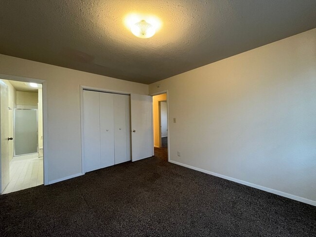 Building Photo - Sheridan Duplexes 01-03