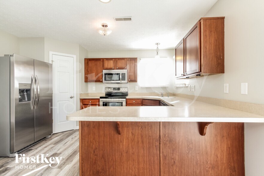 Building Photo - 7250 Pipestone Dr