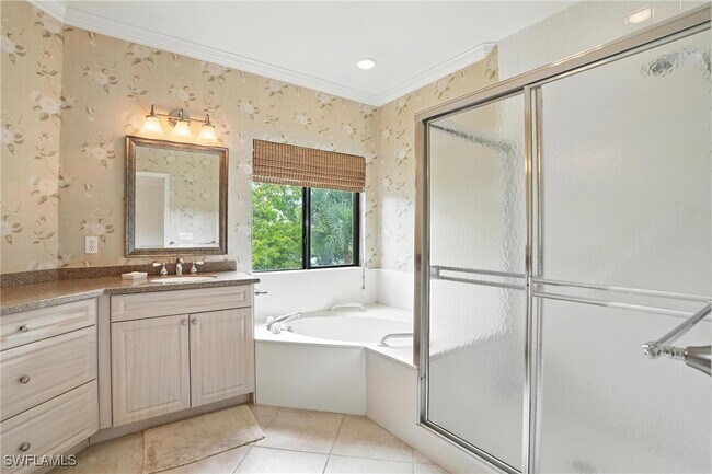 Building Photo - 7032 Pelican Bay Blvd