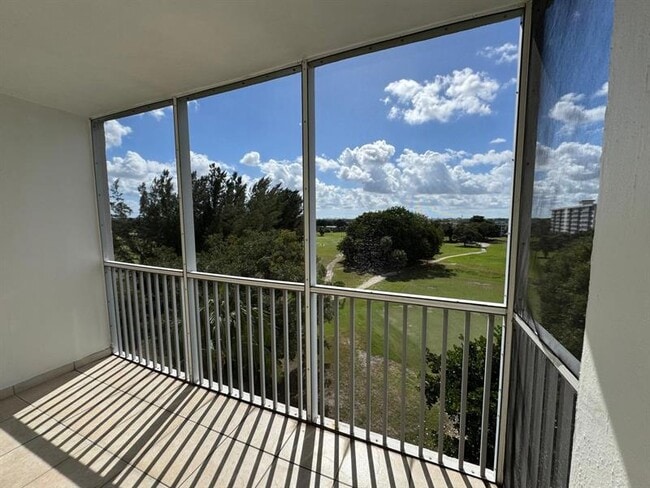 Building Photo - 3200 N Palm Aire Dr