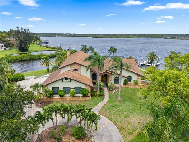 Building Photo - RENT THIS EXTRAORDINARY WATERFRONT HOME