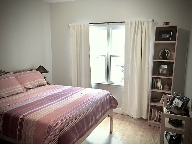 Master bedroom with huge closet and large window with view of the gorgeous backyard - 104B Hillcrest Ave