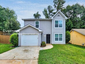 Building Photo - 3 Bed/1.5 Bath Home with Fenced Yard & Garage / Pet-Friendly