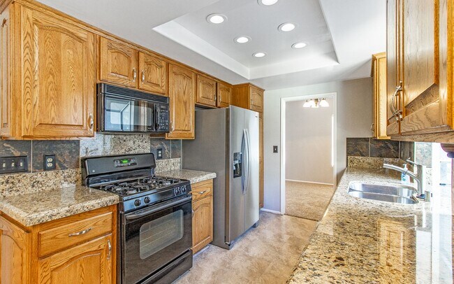 Building Photo - Live in the Whalen Ranch Community!