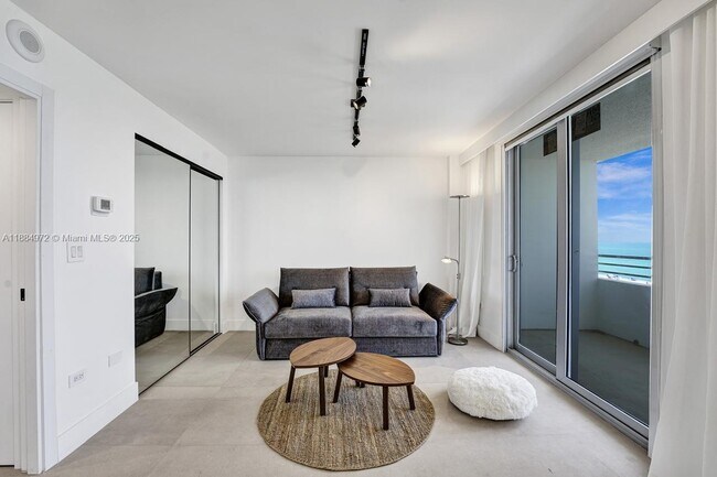 Building Photo - 5555 Collins Ave