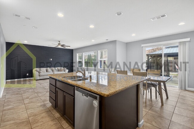 Building Photo - Spacious Elegance Awaits: 4-Bedroom Home with Hardwood Floors in Elk Grove!