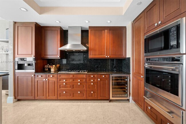 Building Photo - 10295 Collins Ave