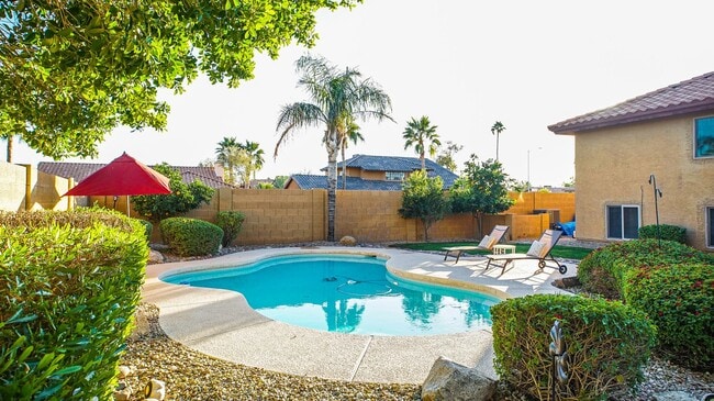 Building Photo - Heated Pool Home/Split Level Magic Zip Code