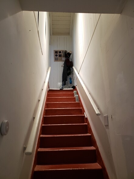 the stairway up to the room - 16020 Firmona Ave