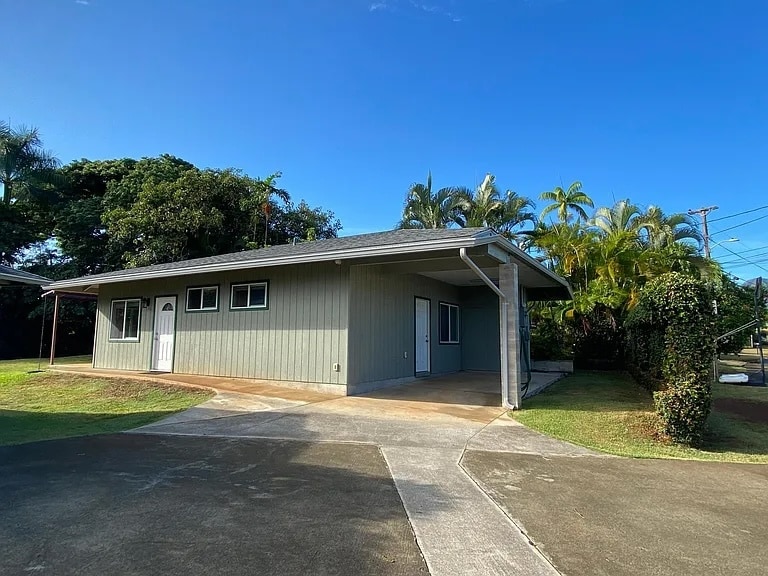 One covered parking and one uncovered parking spot - 1115 Uluopihi Loop