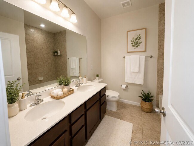 Building Photo - 10783 SW Vasari Way