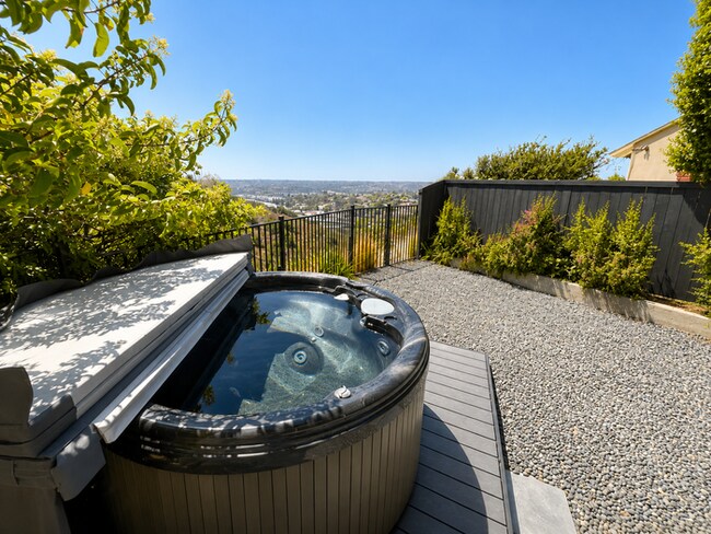 Building Photo - Stunning 3-Level Home with Canyon Views, Private Spa & Multiple Outdoor Living Spaces!