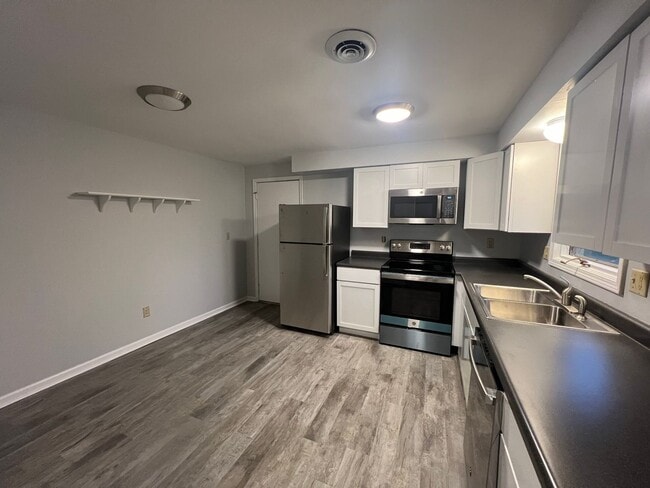 Building Photo - Duplex for Rent by Capital Property Manage...