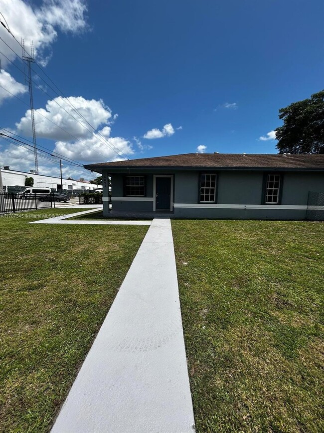Building Photo - 6093 NW 29th Ave