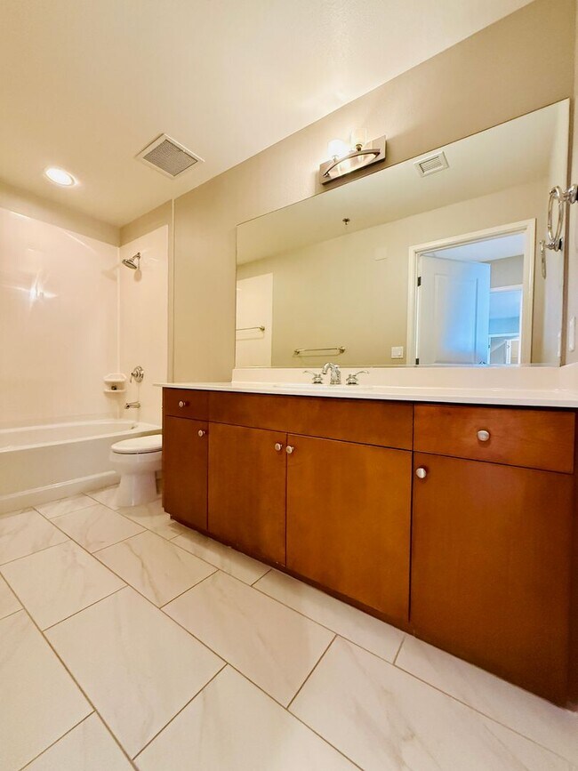 Building Photo - Modern High-Rise Condo with Stunning City and Mountain Views-Near LV Strip, Allegiant Stadium, To...