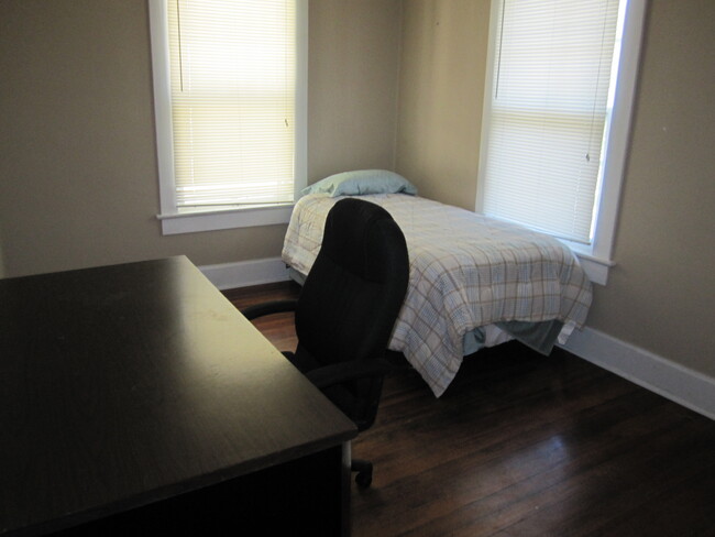 The bedroom as seen from the door. The desk and chair have been removed. The bed is all new. - 1525 South 7th Street