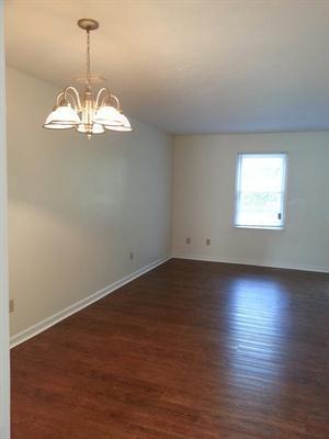 Building Photo - Three Bedroom Townhome, 2.5 bath, with eat-in kitchen, small deck off of living room.